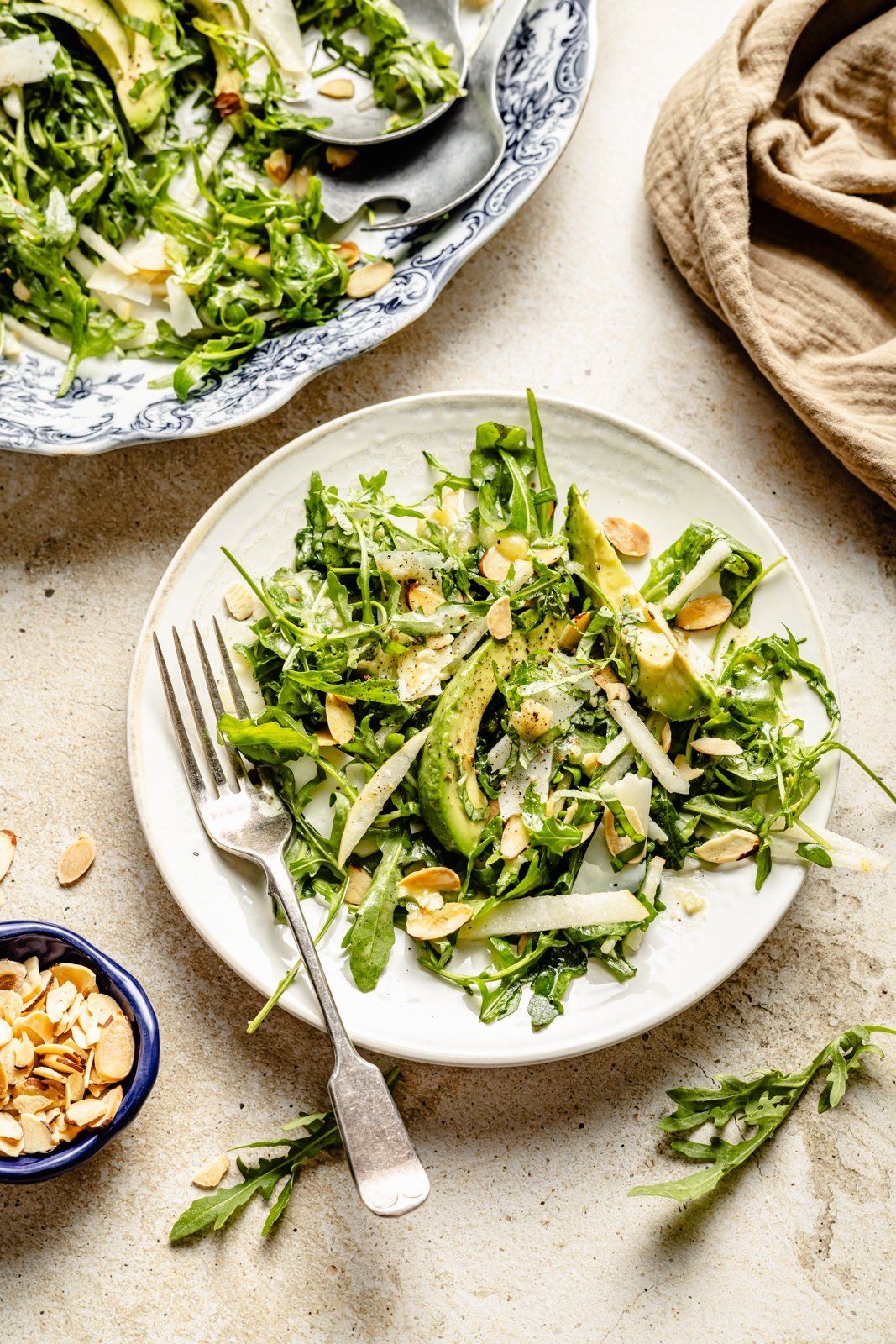 pear arugula salad on a plate