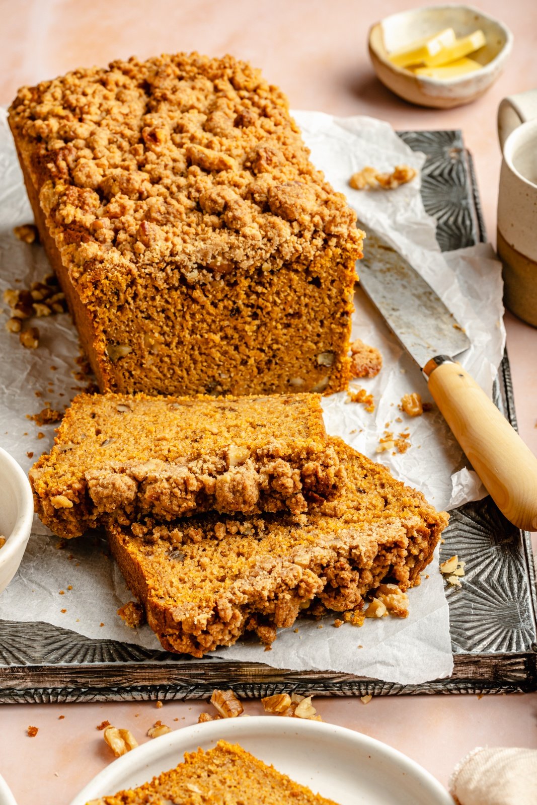 butternut squash bread sliced on a cutting board